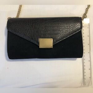 Express. Clutch. With removable strap. Used once. Very good condition.